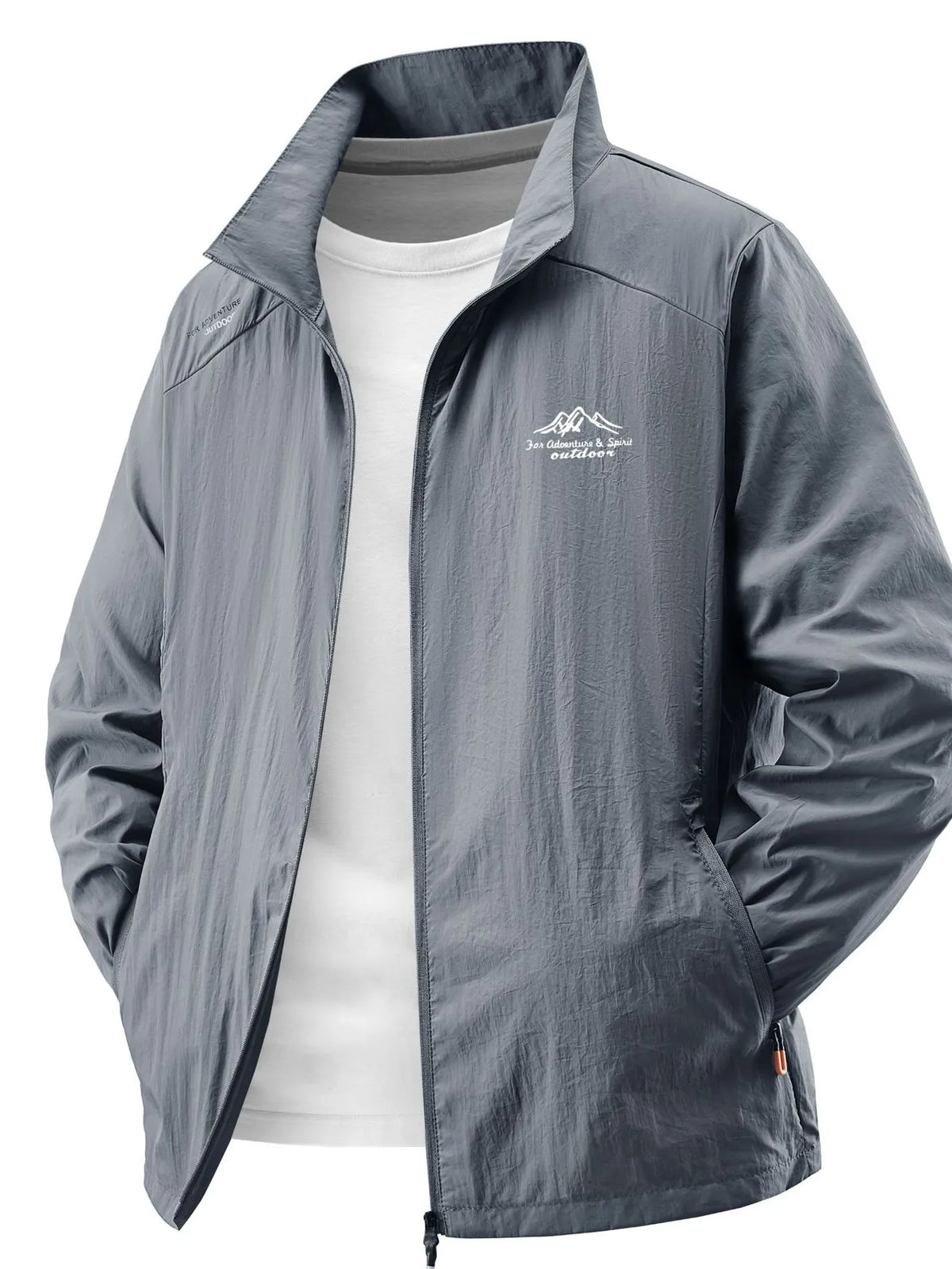 Lightweight windbreaker jacket in dark gray with embroidered mountain logo and zip pockets.