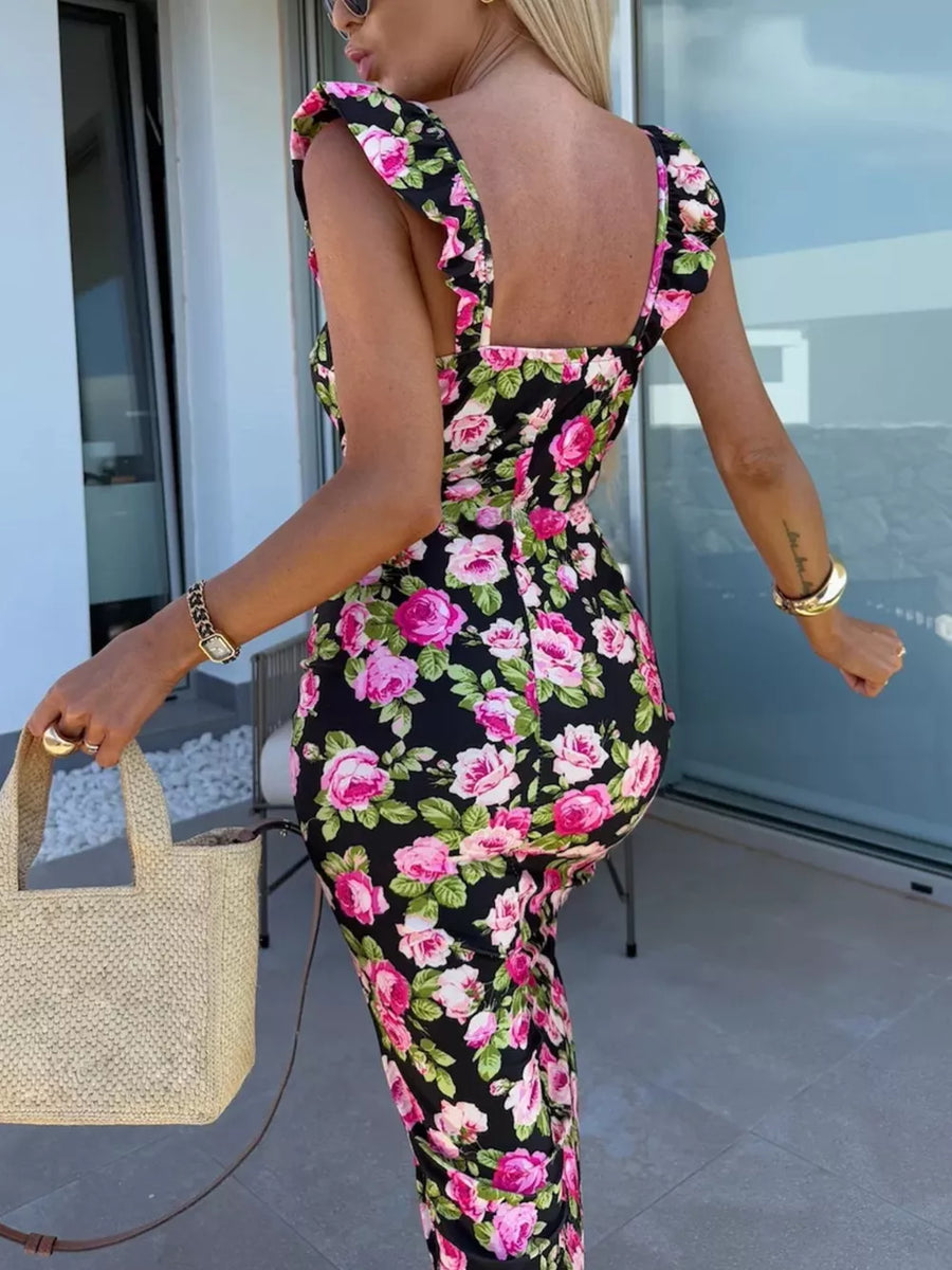 Floral sweetheart midi dress with ruffle straps and a slit in pink floral print.