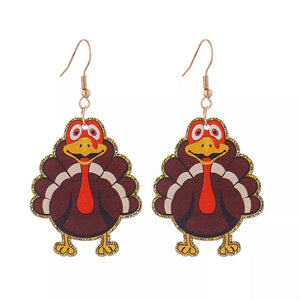 Festive turkey dangle earrings in acrylic with 18k gold hooks.