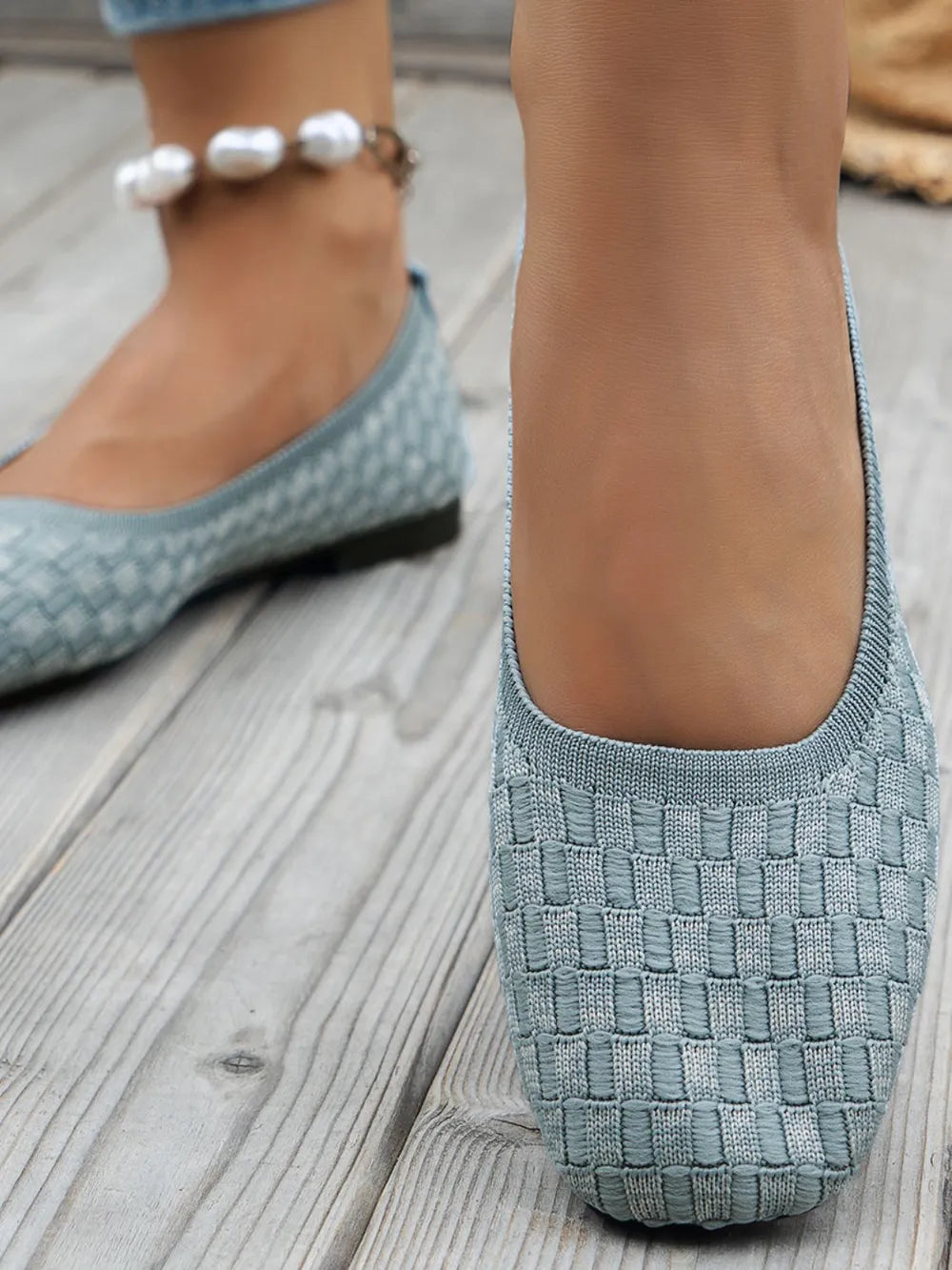 Pastel blue woven knit square-toe flats with a pearl anklet.