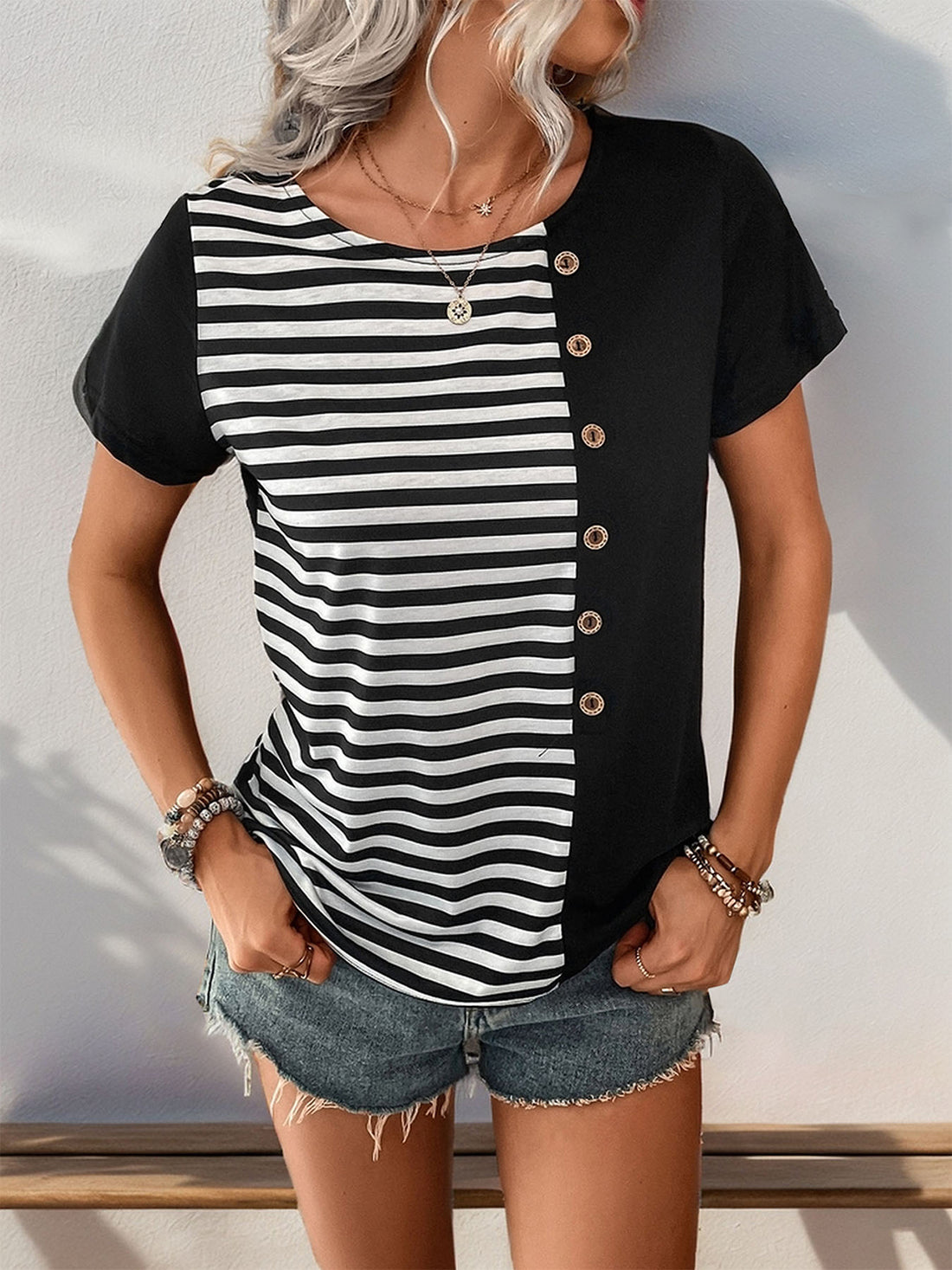 Black and white striped panel button-down tee with short sleeves.