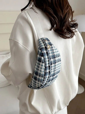 Textured houndstooth belt bag in French Blue with adjustable strap.