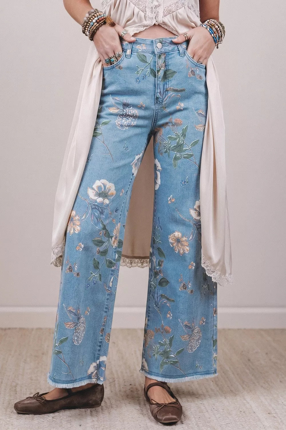 sage green wide-leg jeans featuring pocketed and floral