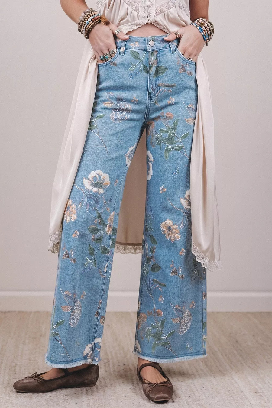 sage green wide-leg jeans featuring pocketed and floral