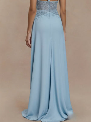 Sky blue lace trim halter neck maxi dress with a flowing skirt.
