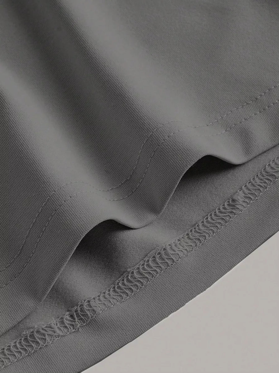 Sleeveless grey midi dress with detailed stitching on hem and neckline.