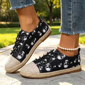 sneakers in black with skull-print and round-toe