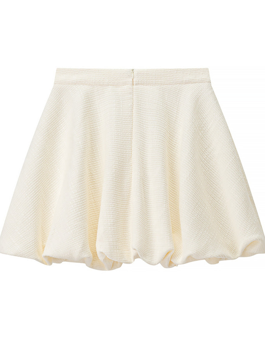 Textured cream bubble hem skirt with buttoned top detail
