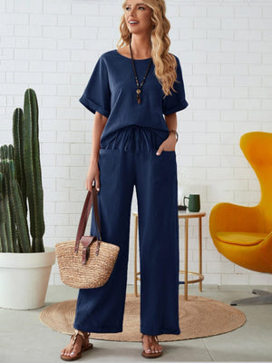 Dark blue linen co-ord outfit set with wide leg pants and a relaxed fit top.