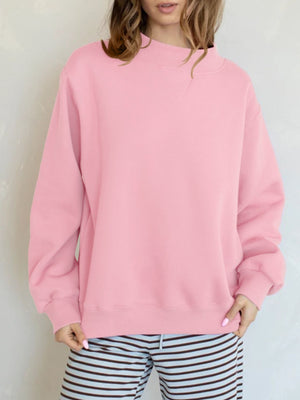 50% viscose, 50% polyester Care instructions: Machine wash cold sweatshirt in baby pink with oversized silhouette