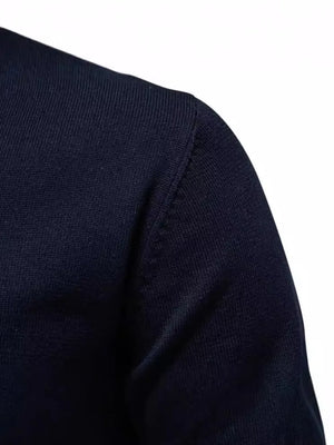 Navy ribbed knit sweater showing shoulder seam detail
