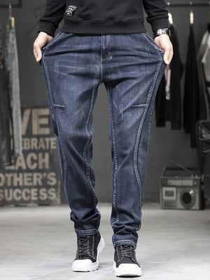 jeans in dark wash denim featuring pocketed and tapered fit