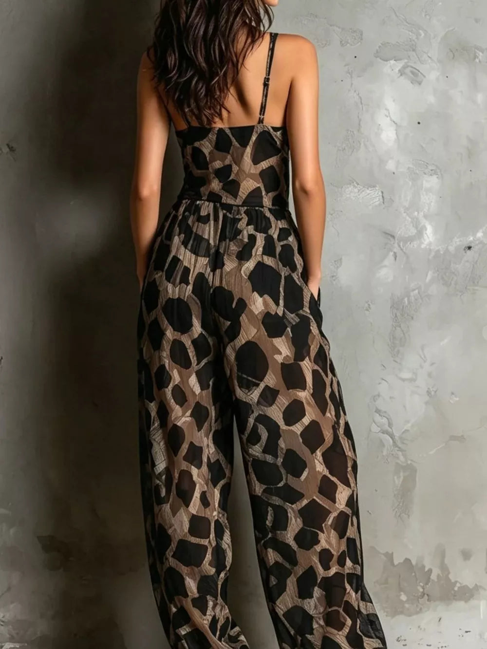 100% polyester Care instructions: Machine wash cold jumpsuit in Leopard with relaxed silhouette