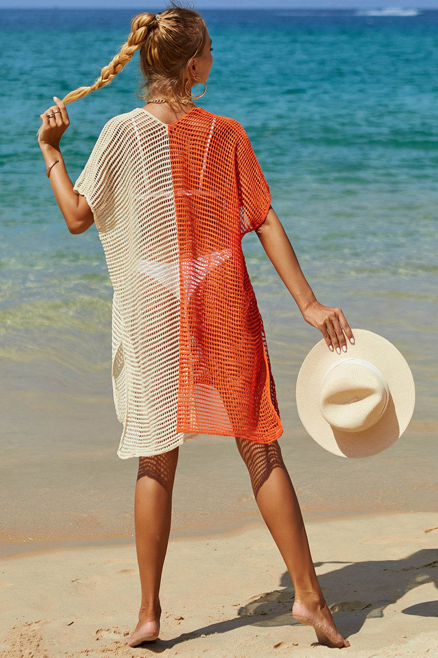 Ombre crochet beach cover-up with split color design in cream and tangerine, short sleeves, V-neck.