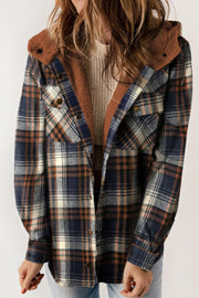 Sherpa-lined plaid overshirt jacket in blue and tan with button front and chest pockets.