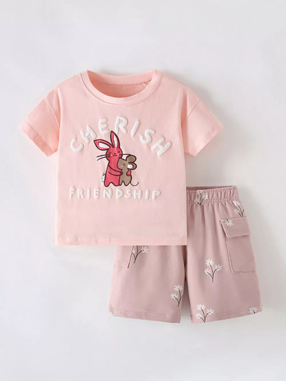 Girls blush pink cotton blend graphic tee and shorts set with bunny and mouse print.