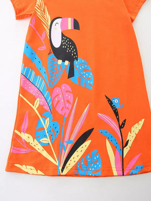 Orange cotton toddler dress with toucan and tropical leaf print