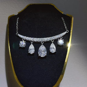 925 sterling silver,Moissanite Carat weight: 6ct Care instructions: Avoid wearin necklace in clear with straight silhouette