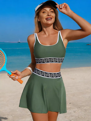Army green tank top and skort set with contrast trim and geometric pattern waistband.