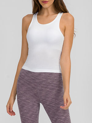 White ribbed racerback tank top with a seamless design, worn by a model.