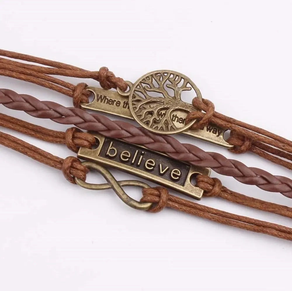 Brown layered braided bracelet with tree of life and believe charms