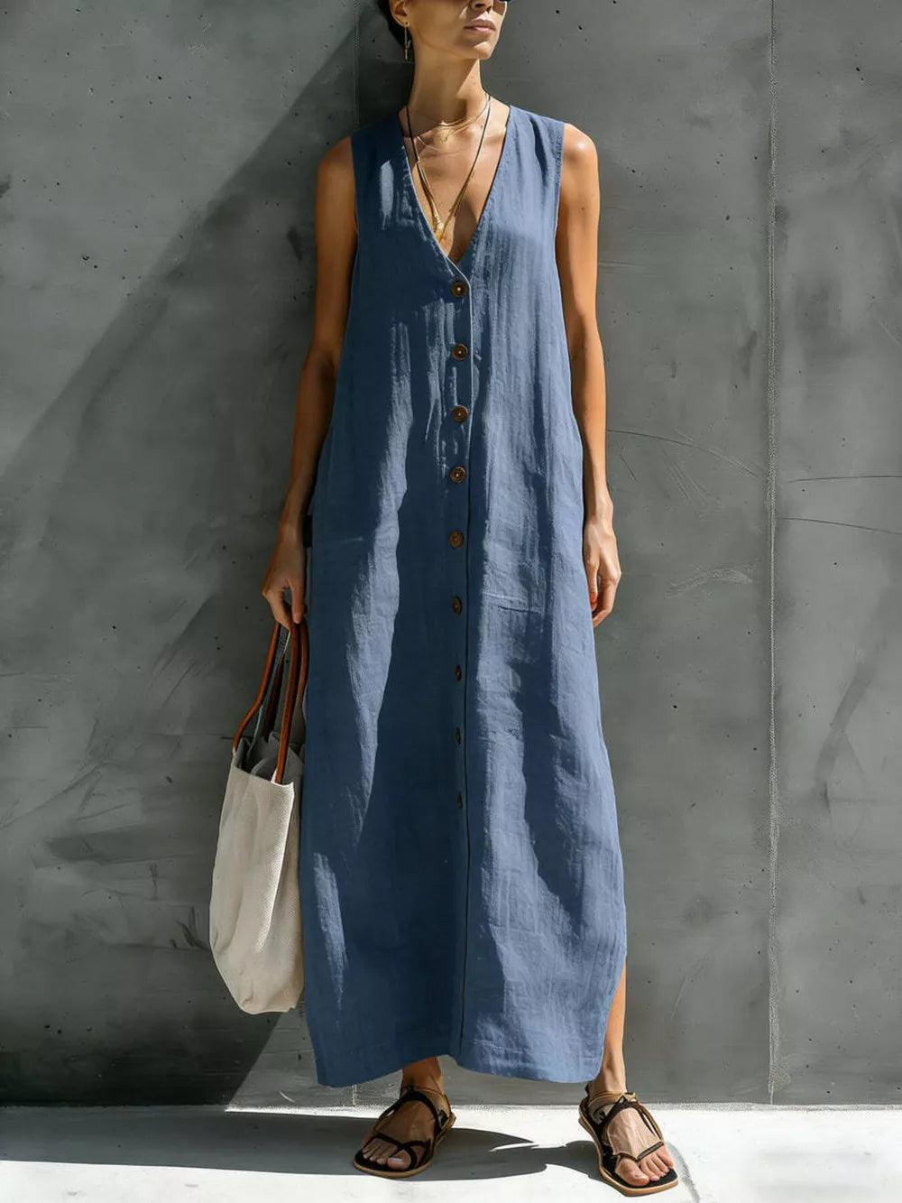 Ivory White maxi dress with side slit and sleeveless