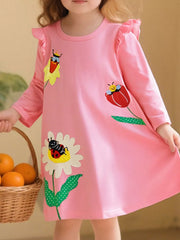 Toddler pink dress with ladybug and bee appliqués, ruffled sleeves, and above-the-knee length.