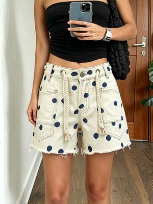 denim shorts in Dusty Pink with polka dot and raw hem