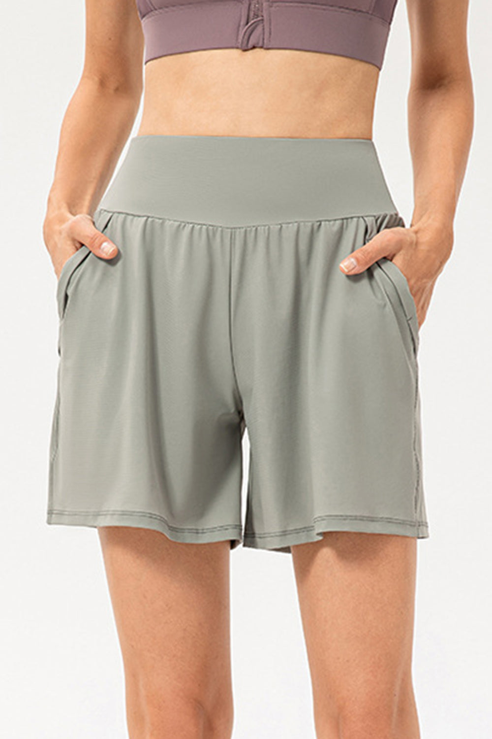 Sage active shorts with pockets and elastic waistband.