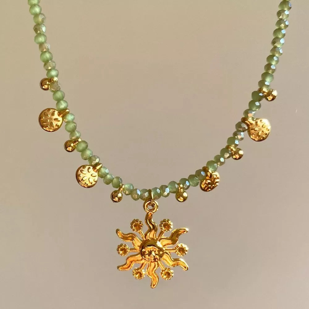 necklace in sage green featuring beaded and jewelry fit