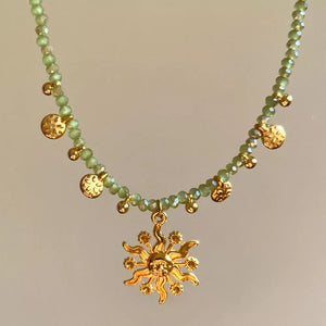 necklace in sage green featuring beaded and jewelry fit