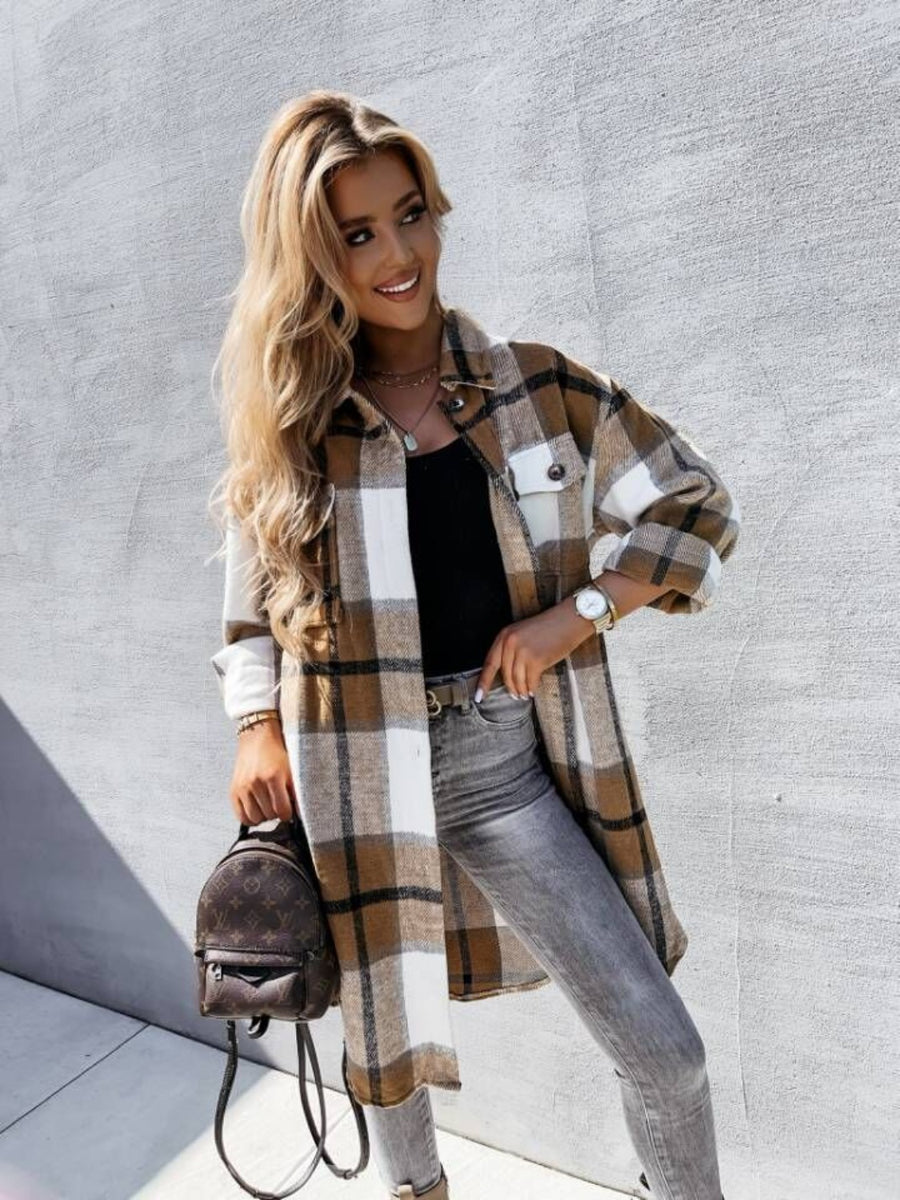 Checkered collar shirt jacket in camel and white with black plaid, long sleeves, and button front.