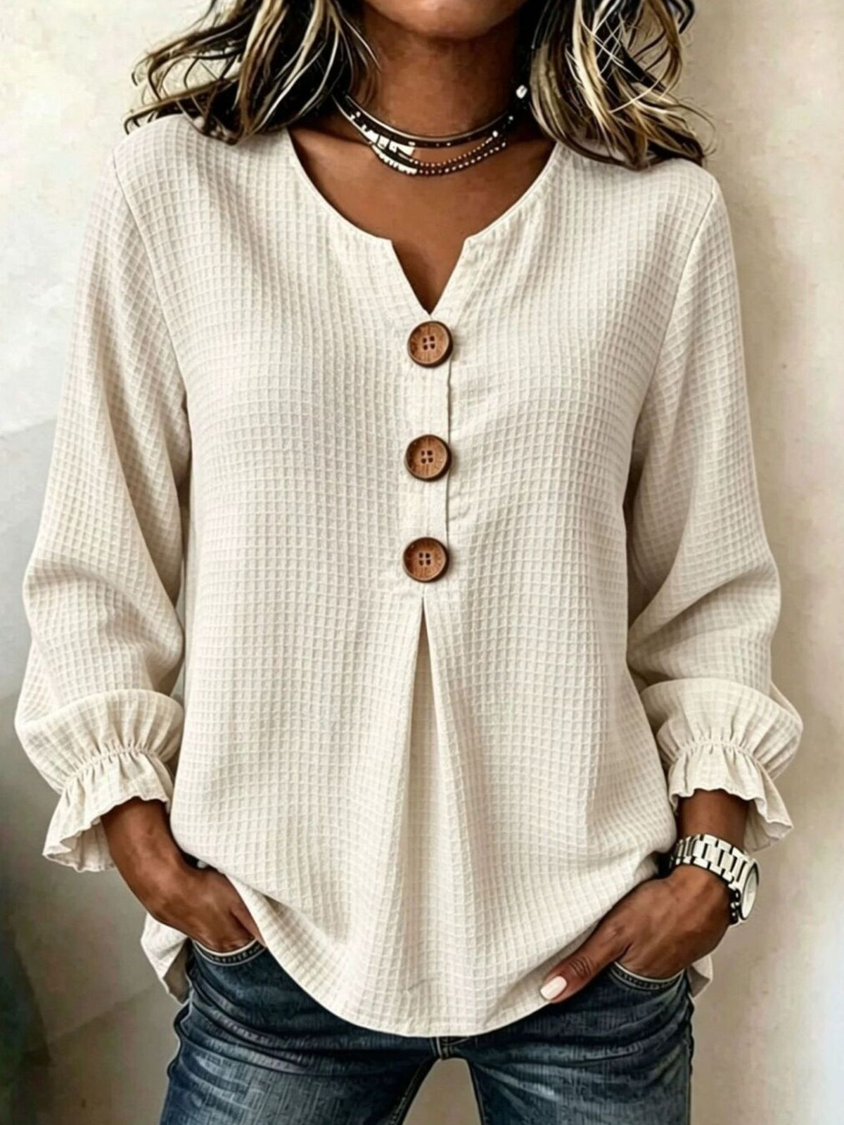 Black blouse with hip-length and half-button
