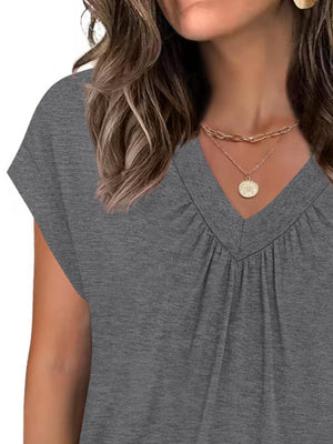 Gray ruched V-neck t-shirt with short sleeves and a relaxed fit.