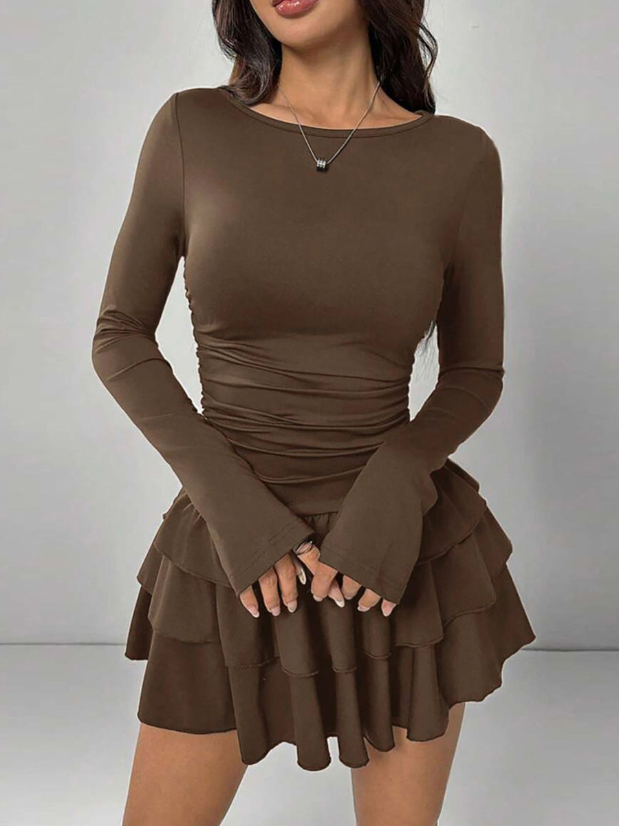 Brown long sleeve mini dress with tiered ruffle hem and ruched waist detail.