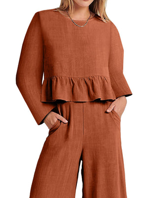 Orange ruffled hem two-piece set with pockets and wide-leg pants.