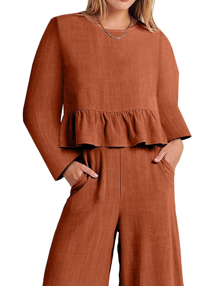 Orange ruffled hem two-piece set with pockets and wide-leg pants.