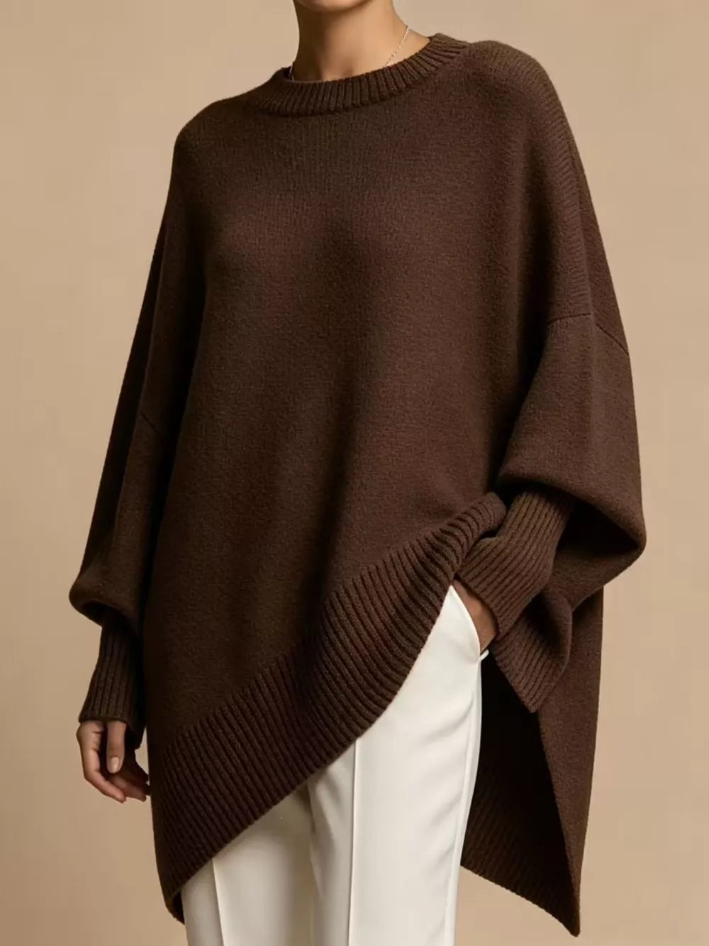 100% polyester Care instructions: Machine wash cold pullover sweater in Brown with oversized silhouette