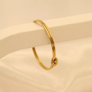 gold with bracelet with knot detail