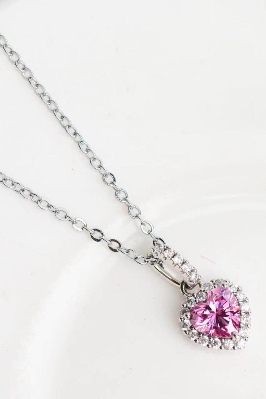 Pink heart halo pendant necklace in 925 sterling silver with clear crystal accents.