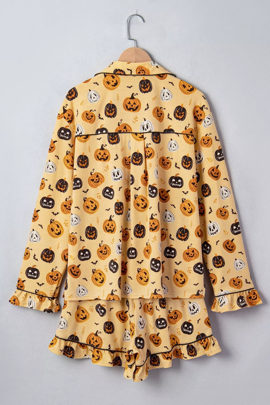 pajama set in orange with pumpkin-print and buttoned