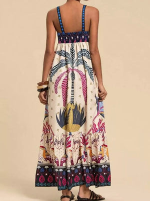 Tropical print maxi swim dress with square neck and tiered hem.