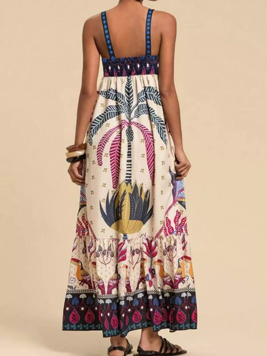 Tropical print maxi swim dress with square neck and tiered hem.