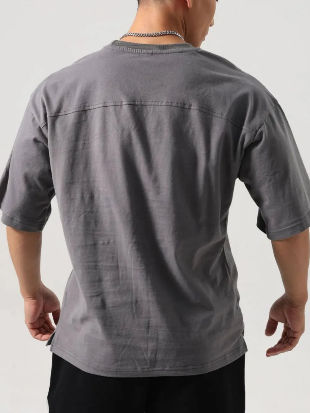 Boxy cut washed cotton t-shirt in gray with a crew neck and short sleeves.