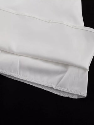 White satin slip with delicate lace trim hem