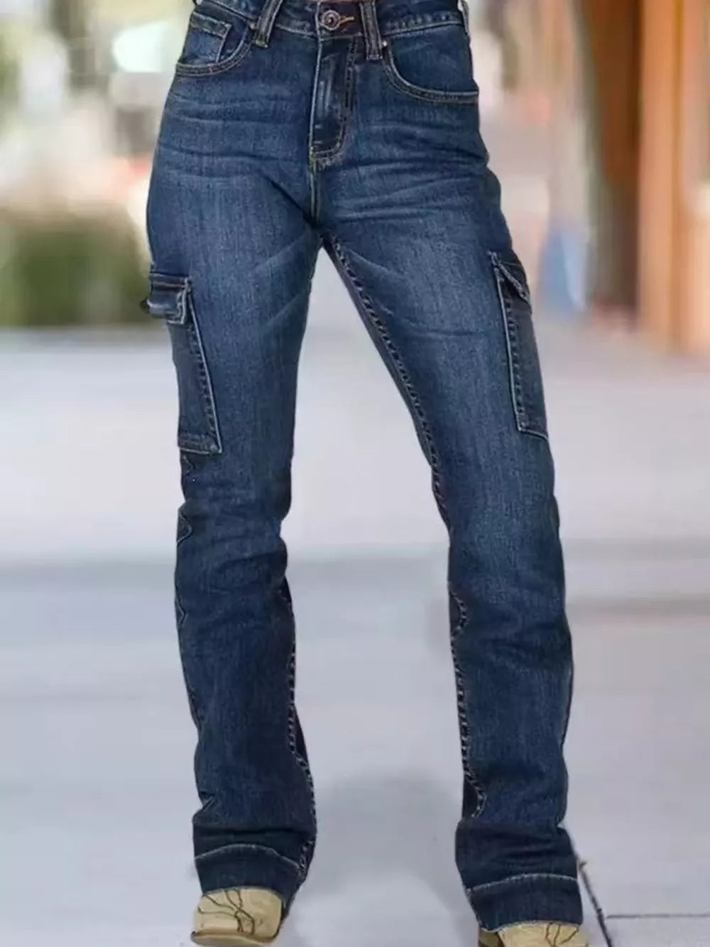 cargo jeans in medium blue featuring pocketed and straight fit