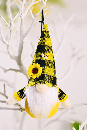 Yellow and black buffalo check gnome ornament with bee and sunflower details.