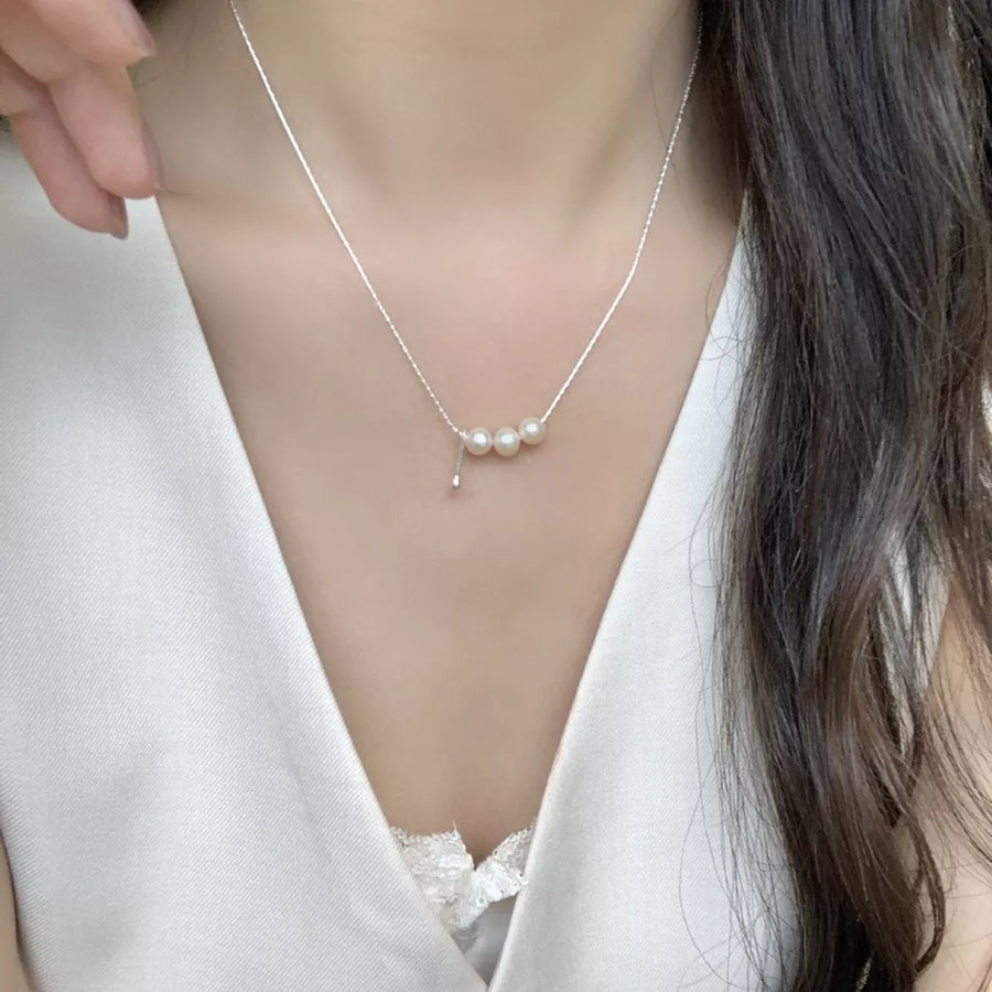 ACCESSORIES in cream with pearl accents and collar length