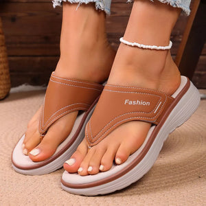 Brown toe post platform sandals with white stitching and "Fashion" detail.