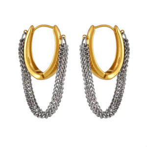Chunky gold hoop earrings with layered silver chain fringe detail.